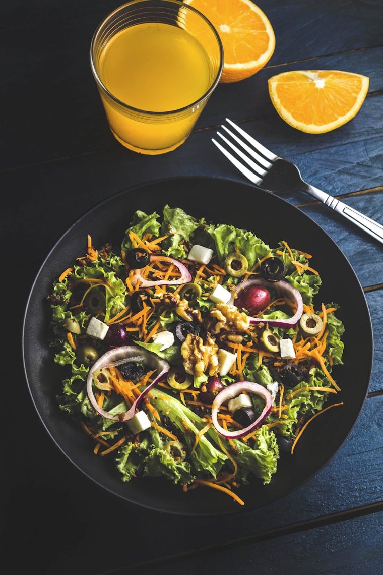 A fresh green salad with juice